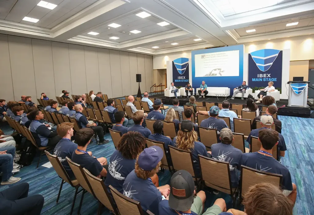Conference room at IBEX filled with students on Career Day
